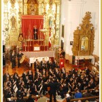 Dirigiendo a la Banda de la A.M.C. Juan Mohedo durante el estreno de "Sto. Cristo de las Penas", marzo  2014